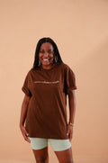 Camiseta Vamos Mulherar o Mundo - Over Marrom